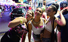Tourists on the street at the resort of Magaluf, in Calvia town, on the Spanish Balearic island of Mallorca, Wednesday, June 10, 2015